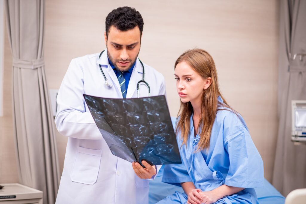 doctor giving patient a medical misdiagnosis